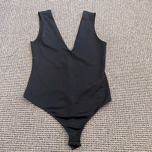 NWOT Free People deep v bodysuit
